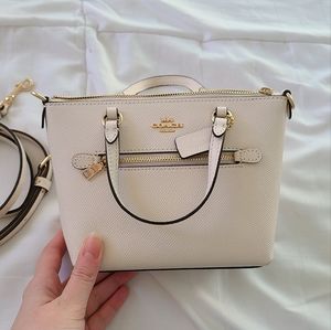 Coach mini gallery tote in white leather with gold hardware!